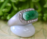 Oblong Jade Ring Framed by Diamonds