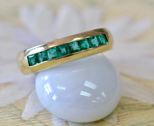 Emerald Band with 8 Princess Cut Emeralds Channel Set