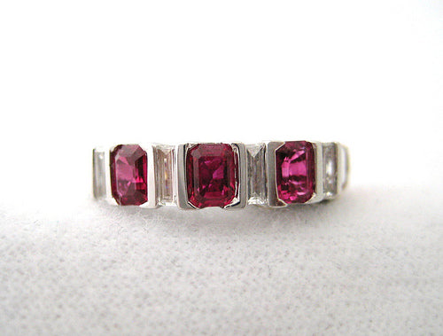 Emerald Shaped Rubies with Four Straight Baguette Diamonds Band