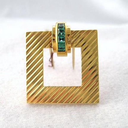 Tiffany & Co. Emerald and Gold Pin, Buckle Motif