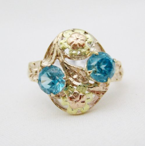 Zircons set in Rose and Yellow Gold Ring