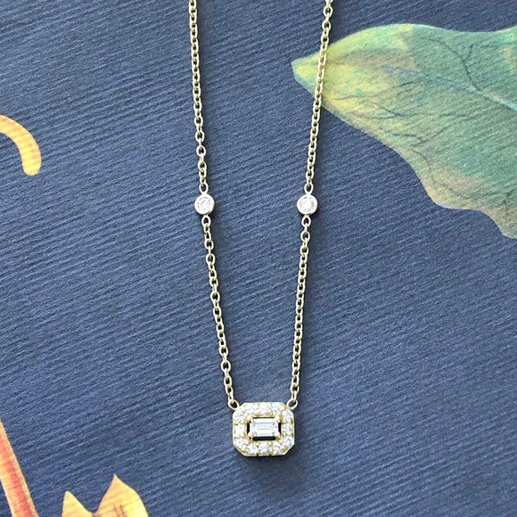 Alluring Diamond Necklace with Emerald cut center diamond