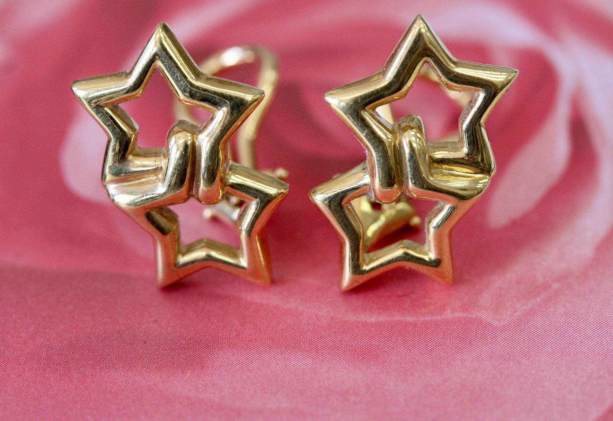 18k Gold Star Shaped Diamond Earrings by TRISTAR INTERNATIONAL CORPORATION,  India