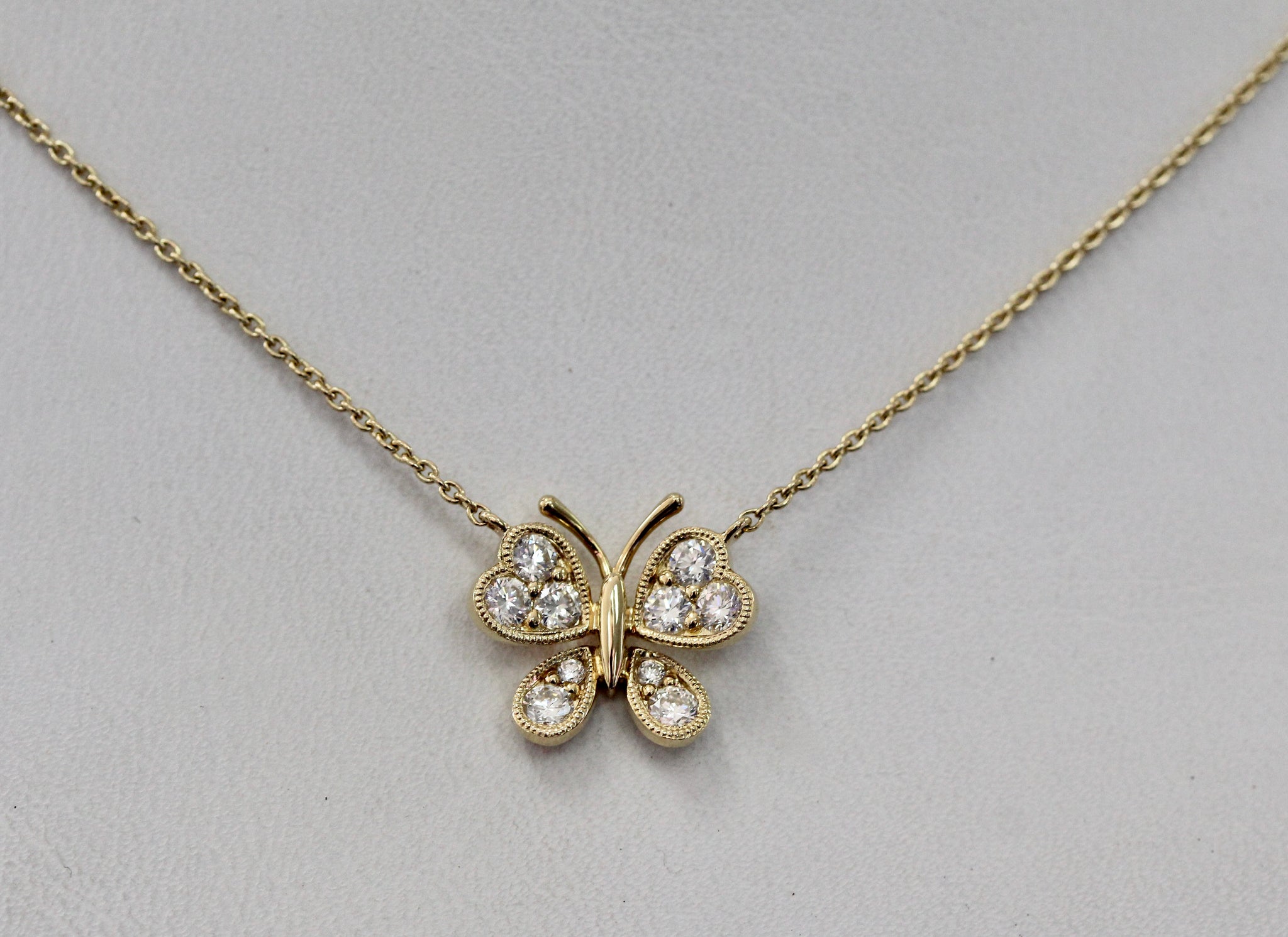 BX GLOW Signature Butterfly Necklace Gold Necklace with Crystals -  https://evelynlozada.com