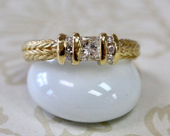 Diamond Ring with Princess Cut center stone