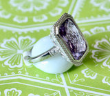 Colorful ~ Sterling Ring with lovely purple center stone
