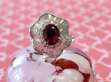 Dazzling ~ Pink Tourmaline Ring Surrounded by Round and Baguette Diamonds